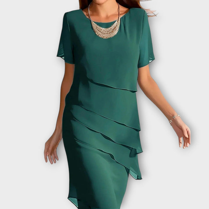 Ione - Ruffle Detail Irregular Hem Tummy Cover Dress